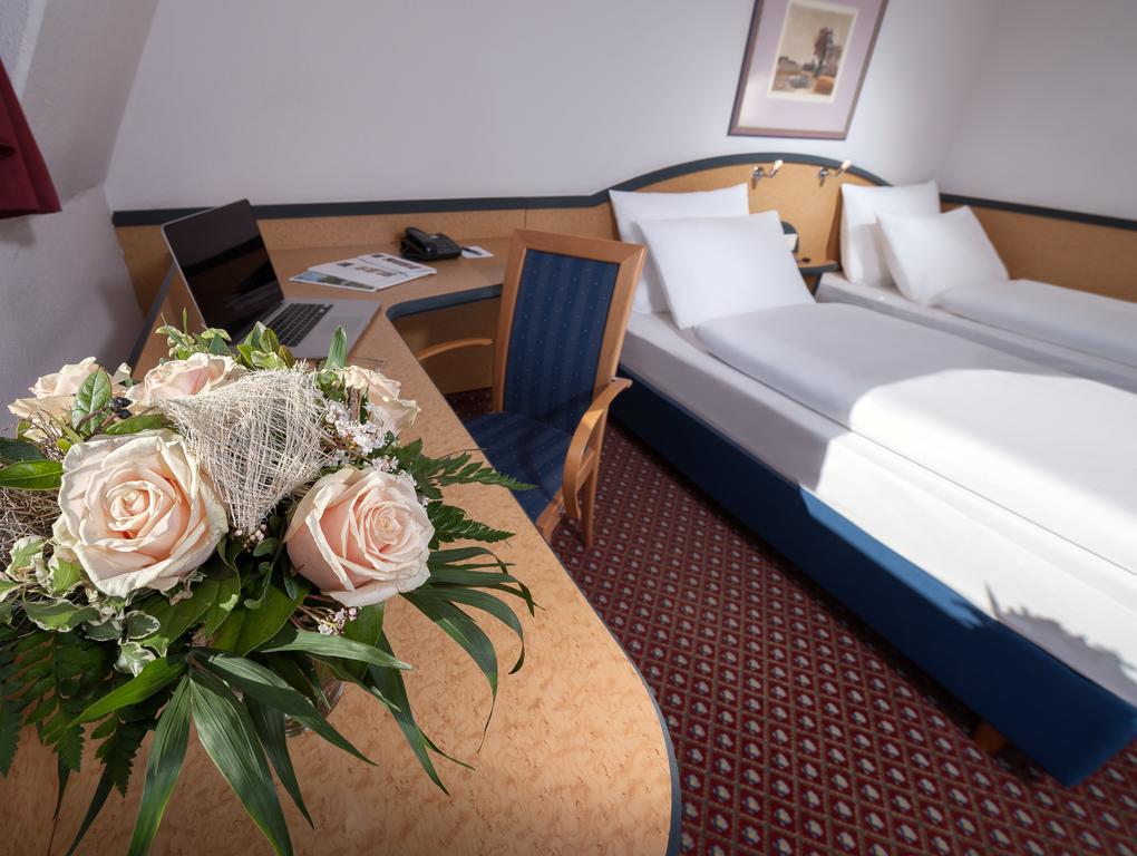 Dorint Airport-Hotel Berlin-Tegel Berlim Quarto foto